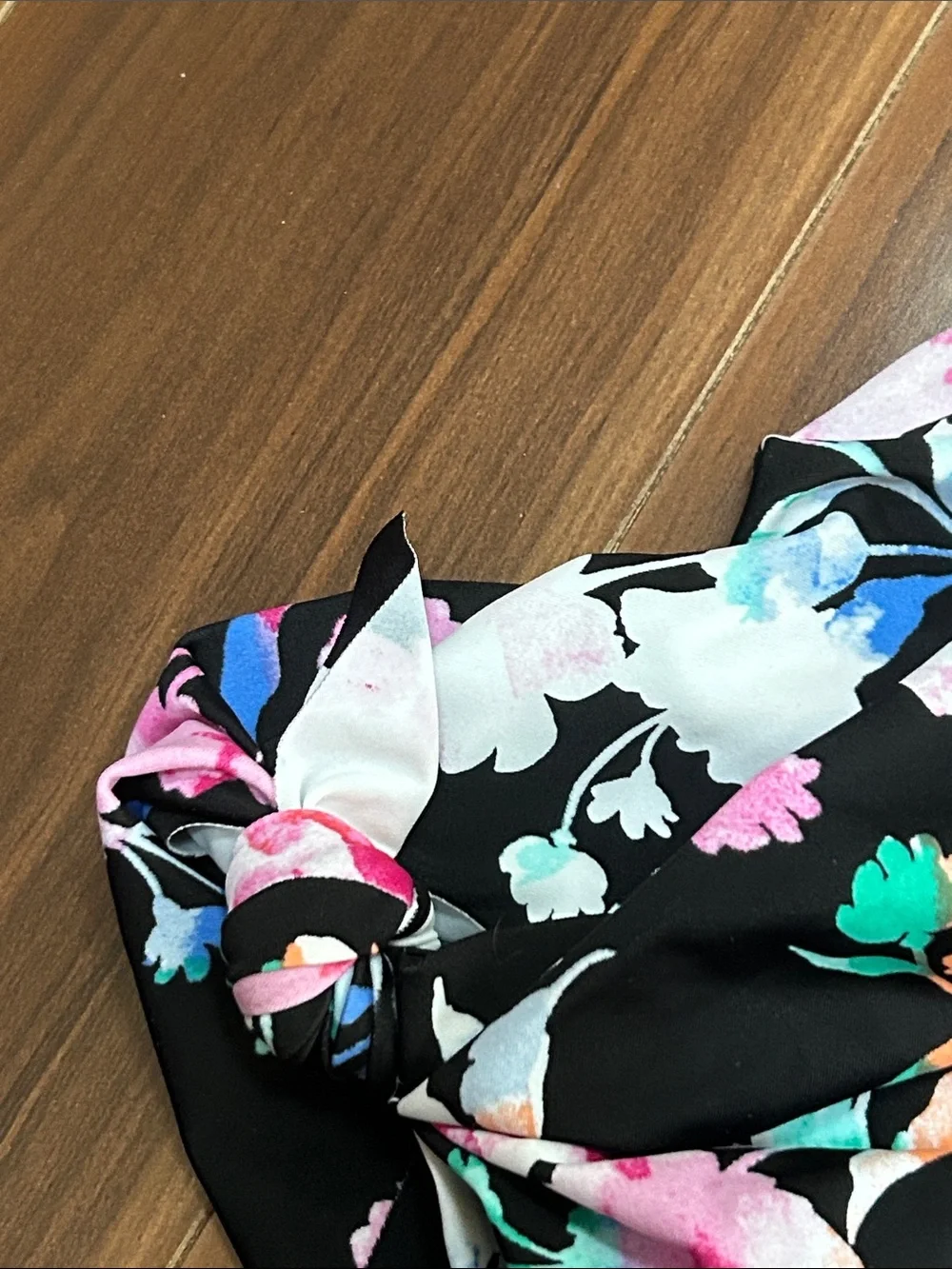 Size 4 Torrid Swim bottoms mini skirt side tie floral